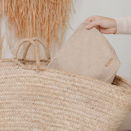 person holding a wet bag