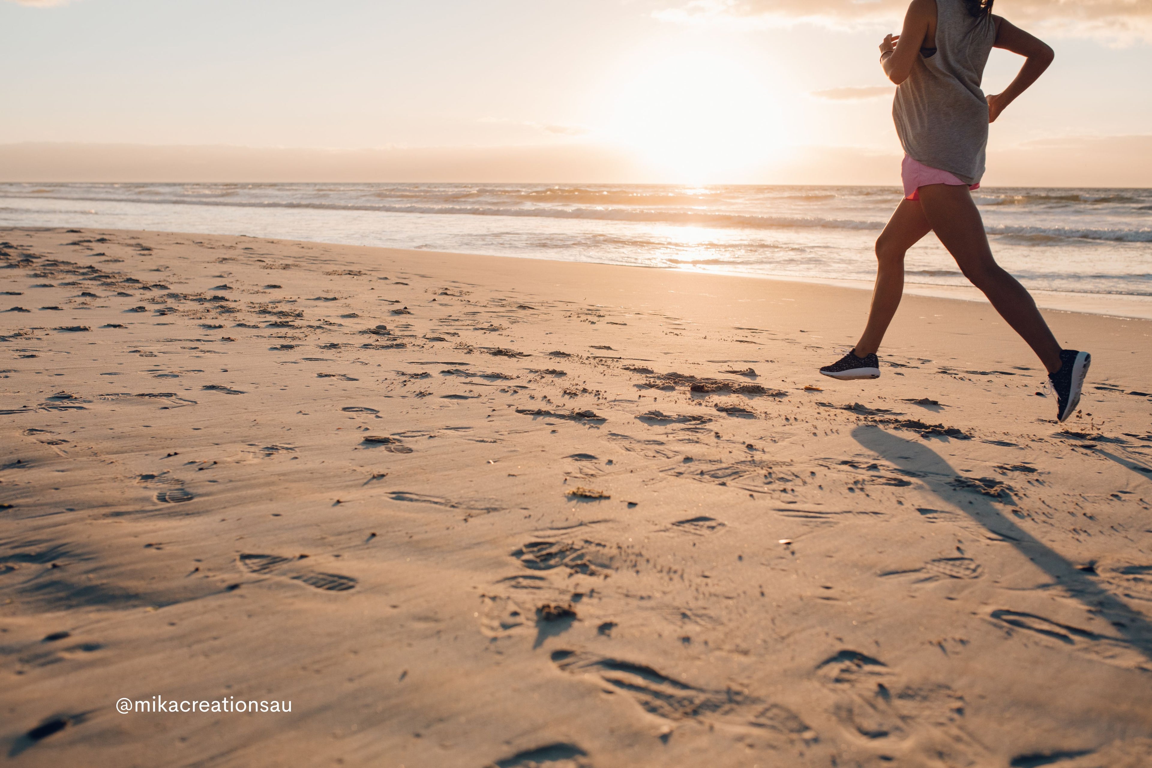 A Woman Running at the Beach